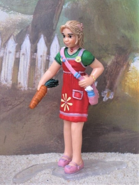 Schleich - Rapariga, alimentando